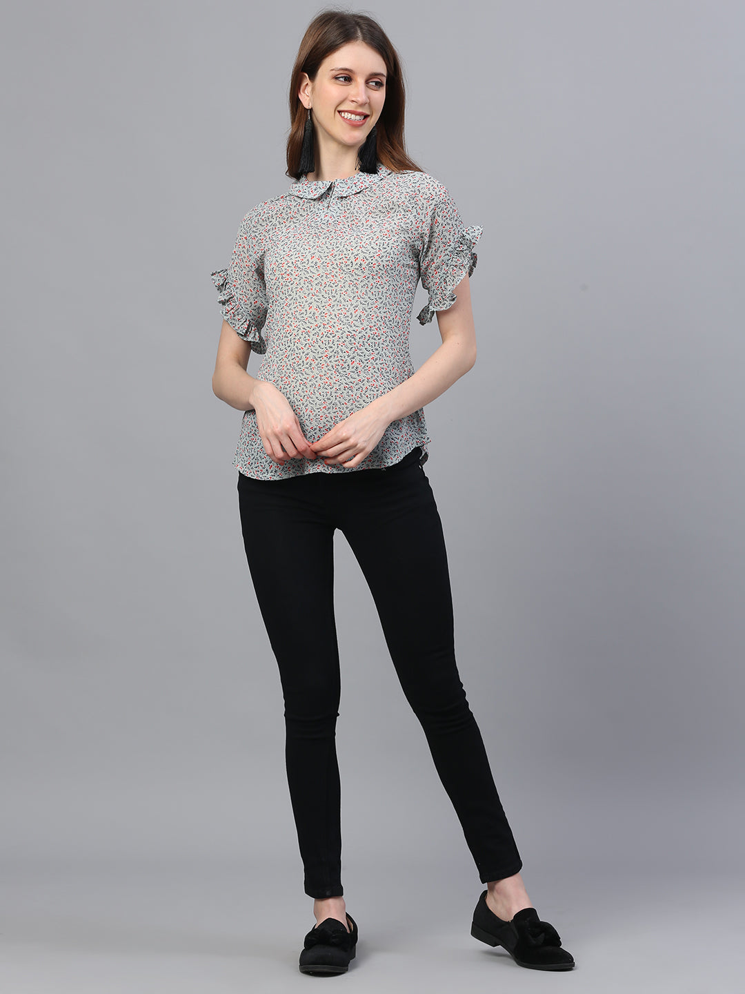 Printed Georgette Top with Peter Pan Collar and Frills on Sleeves.